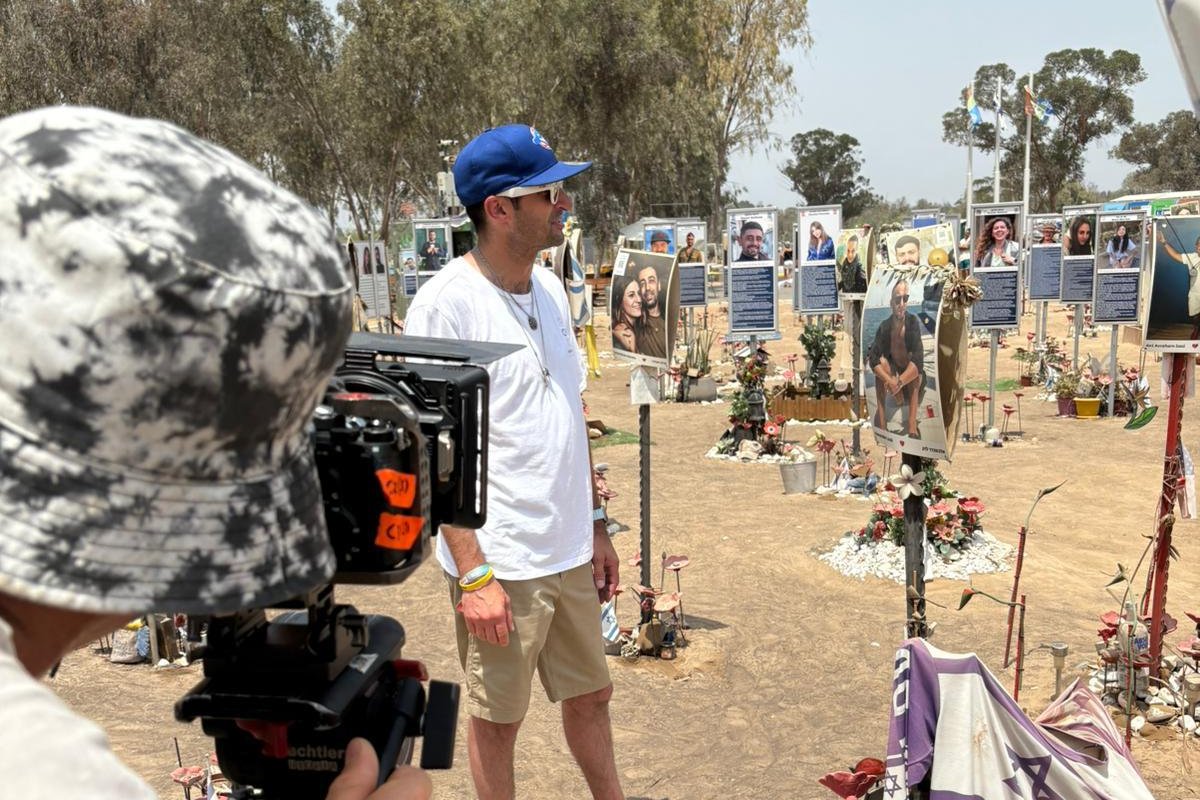 Jesse Brown filming at the Nova memorial site